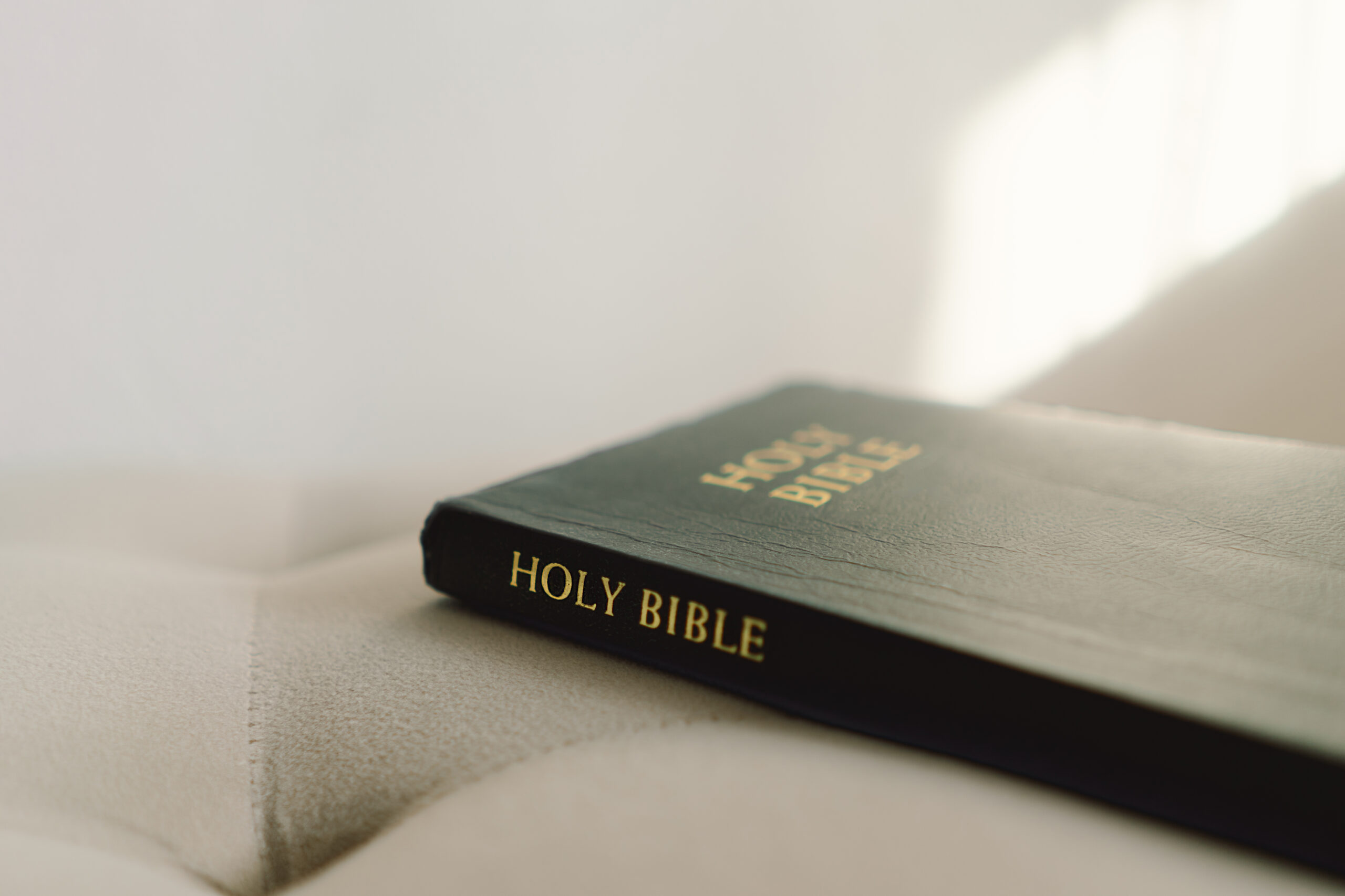 the Holy Bible in home. Concept for faith, spirituality and religion.